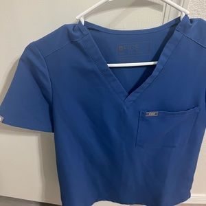 Xs blue top one pocket scrub top